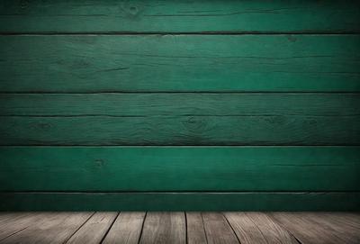 The primary subject of the image is a green wooden wall. The setting is a room with a wooden floor. The visual style is a photo, and the colors and mood are predominantly green, giving the scene a calm and natural atmosphere.