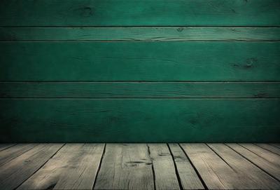 The primary subject of the image is a green wooden wall. The setting is a room with a wooden floor. The visual style is a photo of a green wooden wall. The dominant colors are green and brown, creating a warm and natural atmosphere.