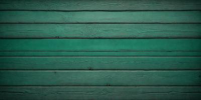 The primary subject of the image is a green wooden wall. The setting is a room with a green wall, and the visual style is a photo. The dominant colors are green, and the overall atmosphere is calm and serene.