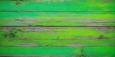 The primary subject of the image is a green wooden plank. The setting is a wooden surface, possibly a table or a wall. The visual style is a close-up of the green wooden plank, showcasing its texture and color. The dominant colors are green and brown, creating a natural and earthy atmosphere.