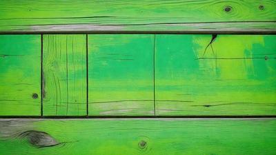 The primary subject of the image is a green wooden door with a green frame. The setting is a room with a green wall, and the visual style is a photo. The dominant colors in the image are green, and the overall atmosphere is bright and lively.