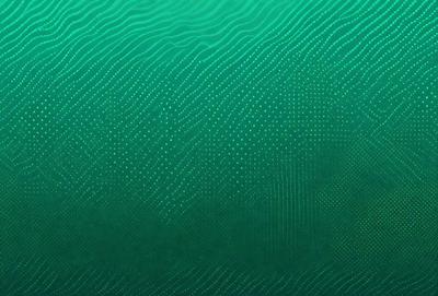 The primary subject of the image is a close-up of a green and blue patterned surface. The setting appears to be a water-like environment, possibly an aquatic or marine setting. The visual style of the image is a combination of a photo and a digital art or illustration, creating a unique and intriguing appearance. The dominant colors in the image are green and blue, which contribute to a calming and serene atmosphere.