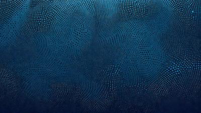 The primary subject of the image is a blue background with a pattern of white dots. The setting appears to be a dark room, and the visual style is a combination of a photo and digital art. The dominant colors are blue and white, creating a calm and serene atmosphere.