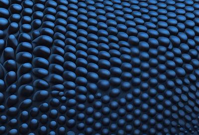 The primary subject of the image is a close-up of a blue surface with a pattern of black bubbles. The setting appears to be a dark room, and the visual style is a close-up of the blue surface. The dominant colors are blue and black, creating a moody atmosphere.