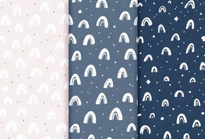 The primary subject of the image is a pattern featuring teeth, which is displayed on three different colored backgrounds. The setting is a white, pink, and blue background, with the teeth pattern being the main focus. The visual style is a combination of digital art and illustration, creating a unique and eye-catching design. The colors and mood of the image are bright, cheerful, and playful, with the teeth pattern adding a touch of whimsy to the overall atmosphere.