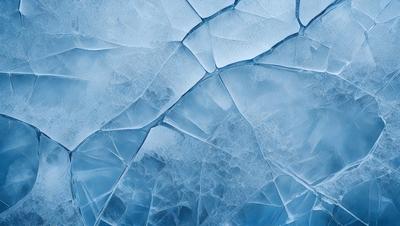 The primary subject of the image is a large piece of ice, which appears to be cracked and broken. The ice is blue and has a clear, transparent appearance. The setting is a cold, icy environment, with the ice being the main focus of the image. The visual style is a close-up of the ice, showcasing its unique texture and appearance. The colors and mood of the image are cold and icy, with the blue hue of the ice creating a sense of chilliness.