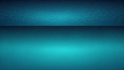 The primary subject of the image is a large body of water, possibly an ocean or a large lake. The water appears to be dark blue, creating a serene and calming atmosphere. The setting is underwater, with the water surface visible above the viewer. The visual style of the image is a close-up of the water, emphasizing its depth and beauty. The colors and mood of the image are predominantly dark blue, which adds to the overall tranquility and depth of the scene.