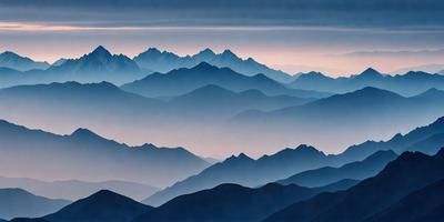The primary subject of the image is a mountain range with a blue sky in the background. The setting is a mountainous landscape, and the visual style is a photo. The dominant colors are blue and gray, creating a serene and peaceful atmosphere.