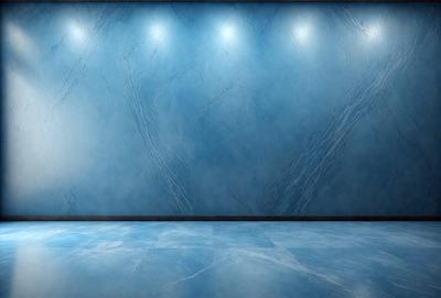 The primary subject of the image is a blue wall with a marble texture. The setting is a room with a blue floor, and the visual style is a photo. The dominant colors are blue and white, creating a calm and serene atmosphere.
