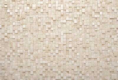 The primary subject of the image is a large, white wall with a pattern of square tiles. The setting is a room with a plain, white background. The visual style is a combination of a photo and digital art, creating a unique and interesting pattern on the wall. The dominant colors are white and grey, giving the wall a clean and modern appearance.