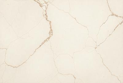 The primary subject of the image is a white marble wall with visible cracks and chips. The setting is a room with a white marble floor. The visual style is a close-up of the marble wall, showcasing its texture and imperfections. The colors and mood of the image are predominantly white, giving it a clean and minimalist appearance.