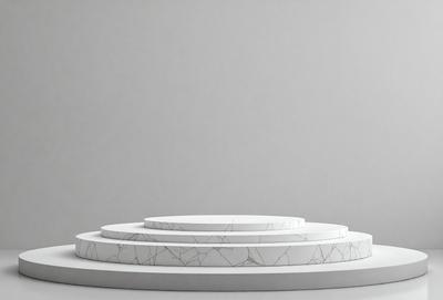 The primary subject of the image is a white marble circle, which is the main object, scene, or focus of the image. The setting is a white background, which provides a clean and minimalist environment for the marble circle. The visual style is a photo, as it captures the marble circle in its natural form. The colors and mood of the image are predominantly white, giving it a clean and elegant appearance.