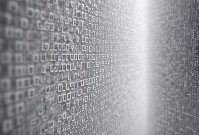The primary subject of the image is a wall covered in a pattern of binary code. The setting is a white wall, and the visual style appears to be a digital art or illustration. The dominant colors are shades of gray, and the overall atmosphere is one of complexity and intricacy.