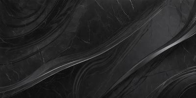 The primary subject of the image is a black marble countertop. The setting is a kitchen, with the countertop being the main focus of the scene. The visual style is a close-up of the marble countertop, showcasing its texture and pattern. The colors and mood of the image are predominantly dark, with the black marble countertop being the main source of contrast.