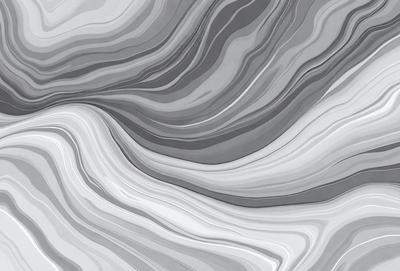 The primary subject of the image is a close-up of a gray and white marble surface. The setting is a stone wall, and the visual style is a photo. The dominant colors are gray and white, creating a calm and serene atmosphere.