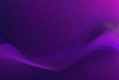 The primary subject of the image is a purple background with a pattern of dots. The setting appears to be a dark room, and the visual style is a close-up of the purple background. The colors and mood of the image are predominantly purple, creating a calm and serene atmosphere.