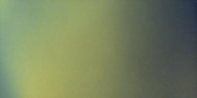 The image features a yellow wall with a green tint. The wall appears to be textured, giving it a unique and interesting appearance. The primary subject of the image is the wall, which serves as the main focus of the scene. The setting is indoors, likely in a room or a space with a similar color scheme. The visual style of the image is a combination of photo and digital art, creating a blend of realism and creativity. The dominant colors in the image are yellow and green, which contribute to a warm