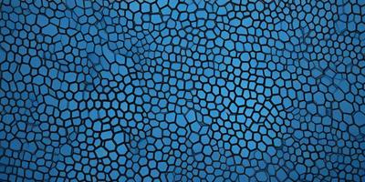 The primary subject of the image is a close-up of a blue, textured surface. The setting appears to be a blue background, possibly a wall or a piece of art. The visual style of the image is a close-up of a textured surface, which gives it a unique and intriguing appearance. The dominant colors in the image are blue and possibly some other shades of blue, creating a calm and soothing atmosphere.