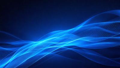 The primary subject of the image is a blue wave or ripple effect, which is the main focus of the image. The setting is a dark blue background, which creates a contrasting and dramatic effect. The visual style is a digital art or illustration, as the wave appears to be a digital creation. The colors and mood of the image are predominantly blue, creating a calm and serene atmosphere.