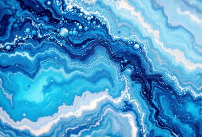 The primary subject of the image is a blue and white ocean scene with a variety of patterns and textures. The setting is a blue and white ocean, and the visual style appears to be a combination of a photo and digital art. The dominant colors are blue and white, creating a serene and calming atmosphere.