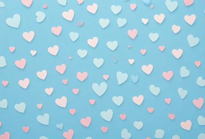 The primary subject of the image is a blue wall with a pattern of hearts. The hearts are scattered across the wall, creating a visually appealing and playful design. The setting is a room with a blue background, and the visual style is a combination of digital art and illustration. The dominant colors are blue and pink, giving the wall a warm and inviting atmosphere.