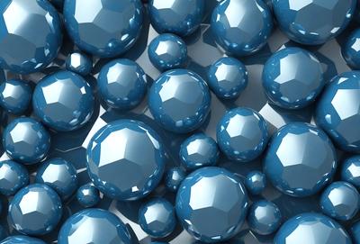 The primary subject of the image is a collection of blue spheres, which are arranged in a visually appealing manner. The setting is a white background, which provides a clean and uncluttered environment for the spheres. The visual style is a combination of photo and digital art, creating a realistic yet artistic representation of the blue spheres. The colors and mood of the image are predominantly blue, giving it a calm and serene atmosphere.