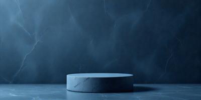 The primary subject of the image is a blue, circular object, possibly a table or a sculpture, placed on a blue surface. The setting appears to be a dark room with a blue wall, creating a moody atmosphere. The visual style of the image is a close-up, focusing on the circular object. The colors and mood of the image are predominantly blue, giving it a calm and serene appearance.