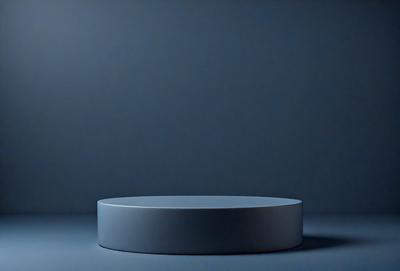 The primary subject of the image is a large, round, blue object, which appears to be a table or a piece of art. The setting is a dark room, with a blue wall as the background. The visual style is a close-up of the blue object, which gives it a prominent and striking appearance. The colors and mood of the image are predominantly dark and moody, with the blue object standing out as the focal point.