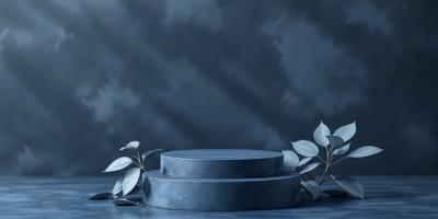 The primary subject of the image is a blue cake placed on a table. The setting is a dark room with a blue background, creating a moody atmosphere. The visual style is a photo, and the dominant colors are blue and gray. The overall mood of the image is mysterious and dramatic.