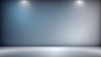 The primary subject of the image is a large, empty white room with a blue background. The setting is a stage or a room with a white wall, and the visual style is a photo. The colors and mood of the image are predominantly white and blue, creating a clean and minimalist atmosphere.