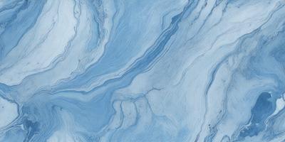 The primary subject of the image is a blue and white marble-like surface, which appears to be a patterned or textured material. The setting is a room with a blue and white color scheme, which complements the blue and white marble-like surface. The visual style of the image is a close-up of the marble-like surface, showcasing its intricate patterns and textures. The colors and mood of the image are predominantly blue and white, creating a calm and serene atmosphere.