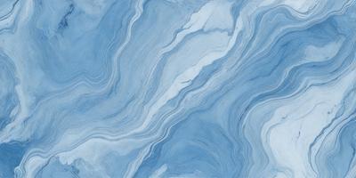 The primary subject of the image is a blue and white marbled surface, which appears to be a tile or a piece of artwork. The setting is a room with a blue and white color scheme. The visual style is a close-up of the marbled surface, showcasing its intricate patterns and textures. The colors and mood of the image are predominantly blue and white, creating a calm and serene atmosphere.