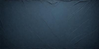 The primary subject of the image is a blue background with a texture that resembles a canvas. The setting is a dark room, and the visual style is a close-up of the blue background. The colors and mood of the image are predominantly dark and moody, with the blue color creating a sense of depth and mystery.