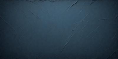 The primary subject of the image is a blue wall with a textured surface. The setting is a room with a blue wall, and the visual style is a close-up of the wall. The dominant colors are blue and grey, creating a calm and soothing atmosphere.