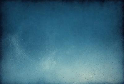 The primary subject of the image is a blue sky with clouds. The setting is a clear day with a cloudy sky, and the visual style is a photo. The dominant colors are blue and white, creating a calm and serene atmosphere.