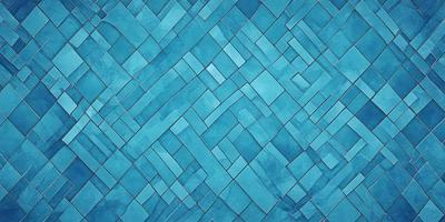 The primary subject of the image is a blue tile with a pattern of interlocking squares. The setting is a blue wall, and the visual style is a close-up of the tile. The dominant colors are blue and white, creating a calm and soothing atmosphere.