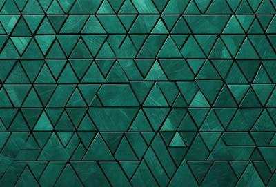 The primary subject of the image is a green wall with a pattern of triangles. The setting is a room with a green wall, and the visual style is a close-up of the wall. The dominant colors are green and black, creating a modern and stylish atmosphere.