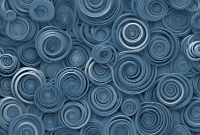 The primary subject of the image is a blue background with a pattern of swirling circles. The setting is a blue surface, and the visual style appears to be a combination of a photo and a digital art or illustration. The dominant colors are blue and white, creating a calm and soothing atmosphere.
