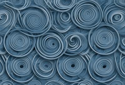 The primary subject of the image is a blue background with a pattern of swirling circles. The setting is a blue surface, and the visual style appears to be a combination of a photo and a digital art or illustration. The dominant colors are blue and white, creating a calm and soothing atmosphere.
