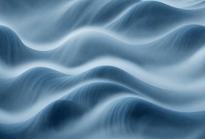 The primary subject of the image is a blue ocean with waves. The setting is the ocean, and the visual style is a photo. The dominant colors are blue and white, creating a calm and serene atmosphere.