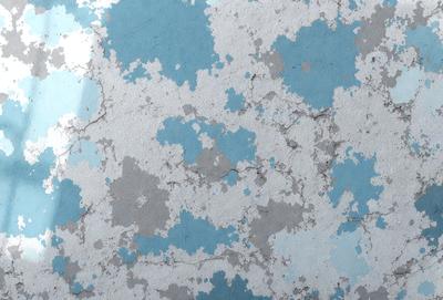 The primary subject of the image is a blue and white wall with a pattern of blue and white spots. The setting is a room with a blue and white wall, and the visual style is a combination of photo and digital art. The dominant colors are blue and white, creating a calm and soothing atmosphere.