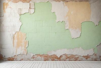 The primary subject of the image is a wall with a green background. The setting is a room with a brick wall, and the visual style is a photo. The colors and mood of the image are predominantly green, creating a calm and serene atmosphere.