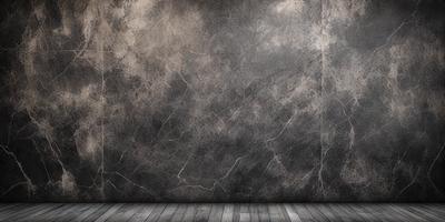 The primary subject of the image is a gray wall with a textured surface. The setting is a room with a wooden floor. The visual style is a black and white photo, giving the image a classic and timeless appearance. The dominant colors are gray and black, creating a moody and dramatic atmosphere.
