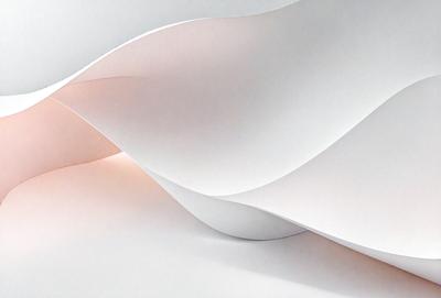 The primary subject of the image is a white sheet of paper. The setting is a white background, and the visual style appears to be a photo. The colors and mood of the image are predominantly white, giving it a clean and minimalist appearance.