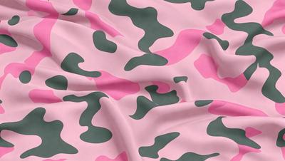 The primary subject of the image is a camouflage patterned fabric. The setting is a pink and green background, which adds a vibrant touch to the scene. The visual style is a close-up of the fabric, showcasing its intricate design. The colors and mood of the image are energetic and lively, with the pink and green hues creating a sense of warmth and liveliness.