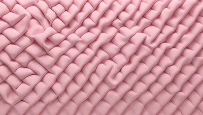 The primary subject of the image is a close-up of a pink fabric with a wavy pattern. The setting is a pink background, and the visual style appears to be a photo. The colors and mood of the image are predominantly pink, creating a warm and inviting atmosphere.