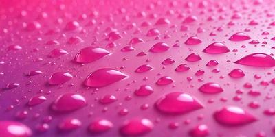 The primary subject of the image is a close-up of a pink surface, possibly a table or a wall, with water droplets on it. The setting appears to be indoors, as the surface is pink and the droplets are on a flat surface. The visual style of the image is a close-up, which emphasizes the details of the water droplets. The colors and mood of the image are predominantly pink, creating a warm and inviting atmosphere.
