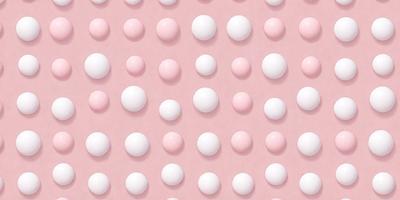 The image features a large pink surface with numerous small white balls scattered across it. The balls are of various sizes and are placed in a pattern, creating a visually appealing and intricate design. The combination of pink and white colors gives the scene a warm and inviting atmosphere.