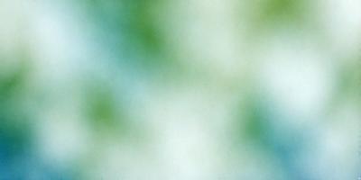 The primary subject of the image is a green background with a white sky. The setting appears to be a natural environment, possibly a forest or a park. The visual style of the image is a combination of photo and digital art, creating a unique and artistic representation of the scene. The dominant colors in the image are green and white, giving it a serene and calming atmosphere.