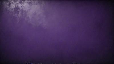 The primary subject of the image is a purple sky, which creates a unique and striking visual effect. The setting is a cloudy sky, and the visual style appears to be a combination of a photo and digital art. The dominant colors in the image are purple and gray, giving the scene a moody and atmospheric feel.